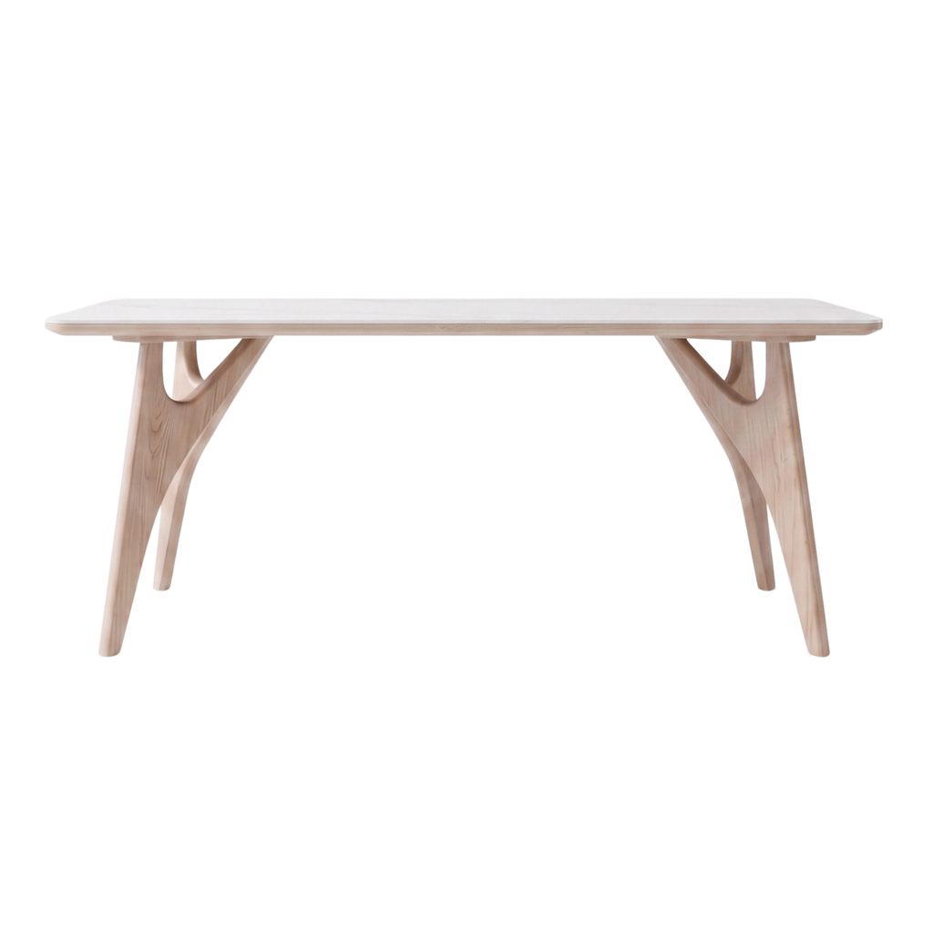 Front view of the Clairwood sintered stone dining table with wood legs