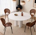 Elegra round sintered stone dining table with painted base by ASHCo