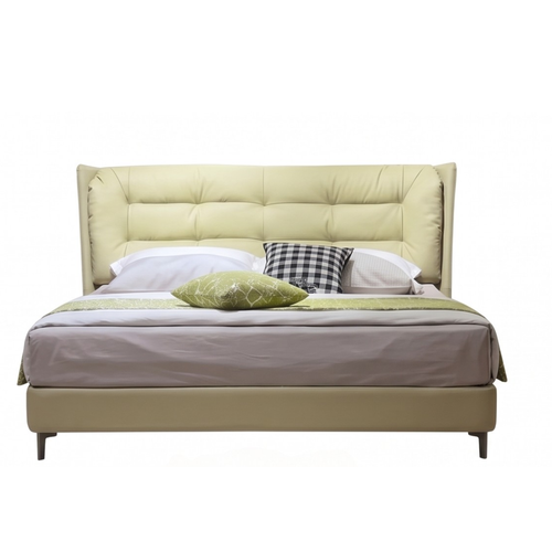 Front view of the Fernwing bed with padded wingback headboard