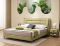 Fernwing green wingback bed styled in a calm modern bedroom