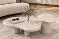 Ivorstone pebble coffee table set styled in a calm modern living room