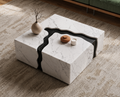 Marblonc sculptural coffee table styled in a refined modern living room