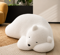 Nanuk polar bear-inspired lounge chair styled in a modern living room