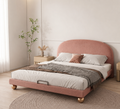 Rosova dusty rose upholstered bed styled in a calm modern bedroom