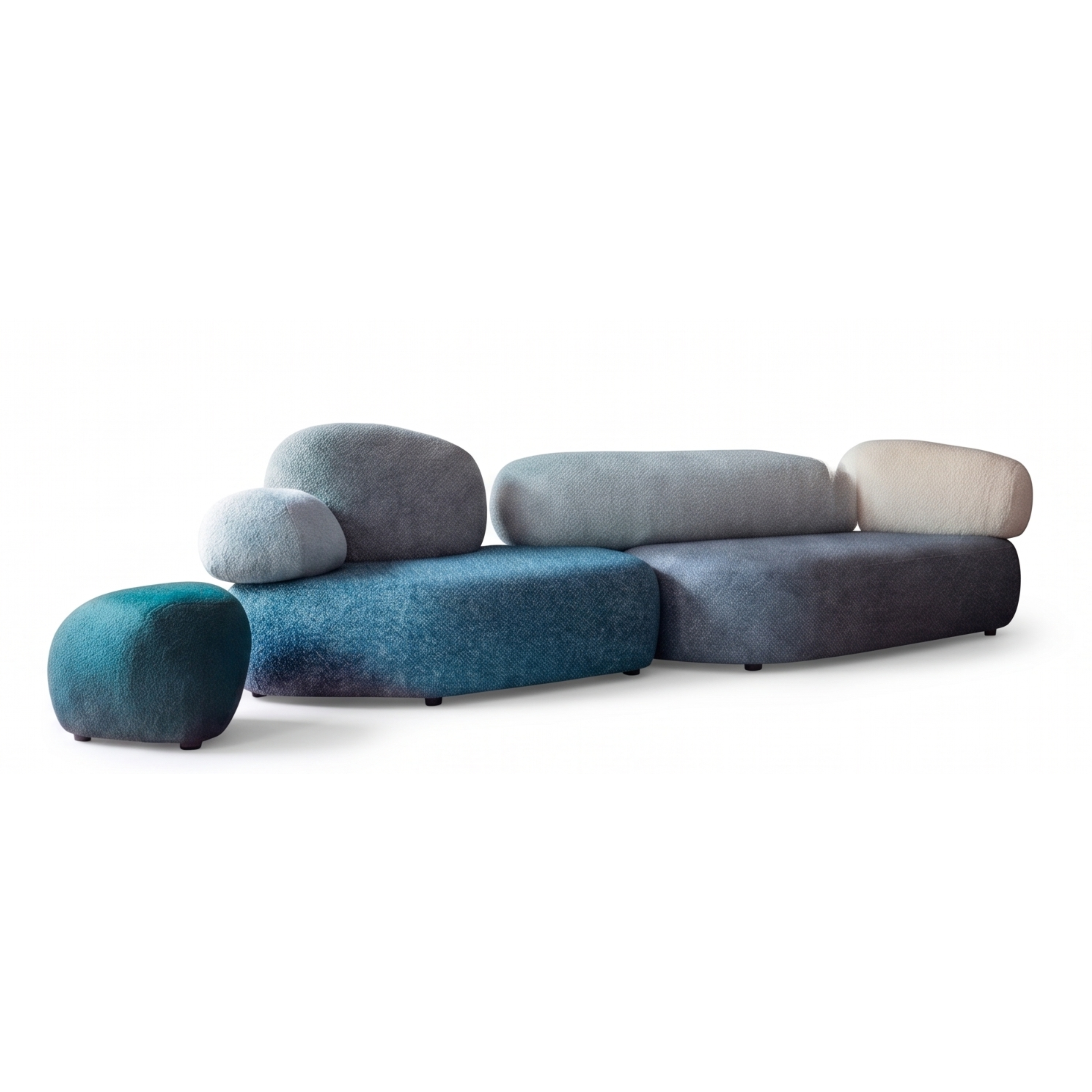 Angled view of the Terrazzo pebble sofa with layered blue and gray modules